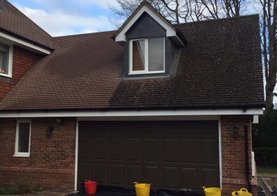 Roof cleaning image on house near Farnham, Surrey