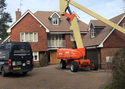 Moran Roofing roof cleaning with mobile elevated work platform