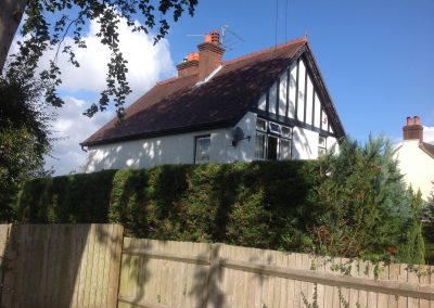Re-roofing image of a house in Farnham, Surrey