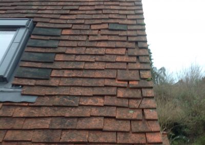 Image of clay tiles and velux window installation, Surrey