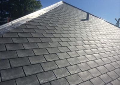 Moran roofing project image of new slate tiles and lead flashing, Farnham, surrey.